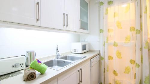 Kuchyňa alebo kuchynka v ubytovaní Residencial Azul Marino