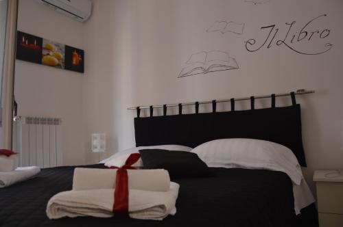 Ένα ή περισσότερα κρεβάτια σε δωμάτιο στο Il Sogno Caltagirone