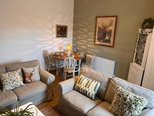 A seating area at Berry View - Idyllic cosy cottage on berry farm