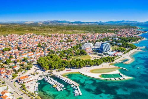 an aerial view of a city with a harbor at Apartment and Rooms Dalmatiko in Vodice