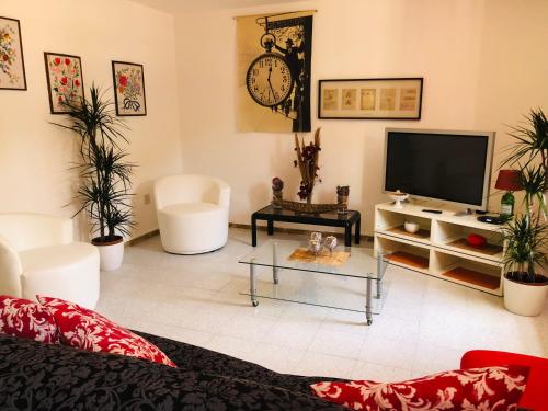 TV a/nebo společenská místnost v ubytování B&B dell'Amicizia