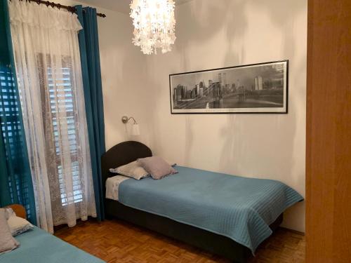 Tempat tidur dalam kamar di Apartments Beata