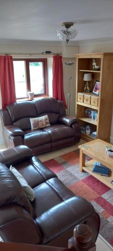 A seating area at 2 Barge Cottage