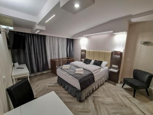Ένα ή περισσότερα κρεβάτια σε δωμάτιο στο Apartamenty Hayduk