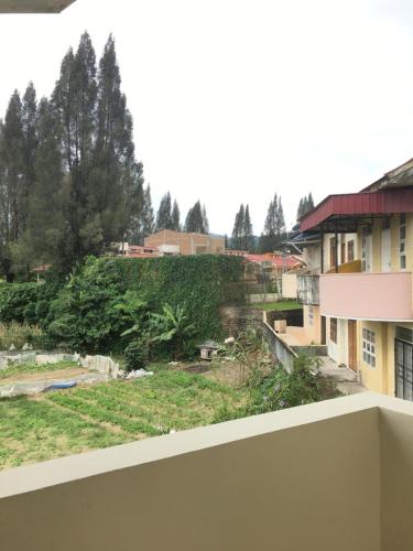 a view from the balcony of a building at Villa Bukit Indah in Berastagi