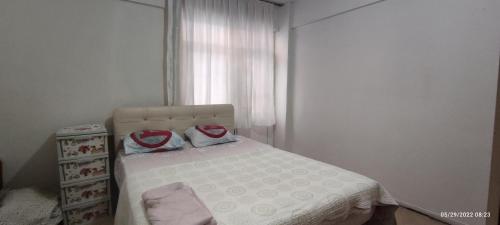 Postel nebo postele na pokoji v ubytování Şarköy Günlük Kiralık Ev