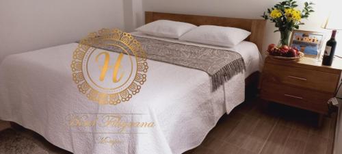 Postel nebo postele na pokoji v ubytování Hotel Filigrana Mompox
