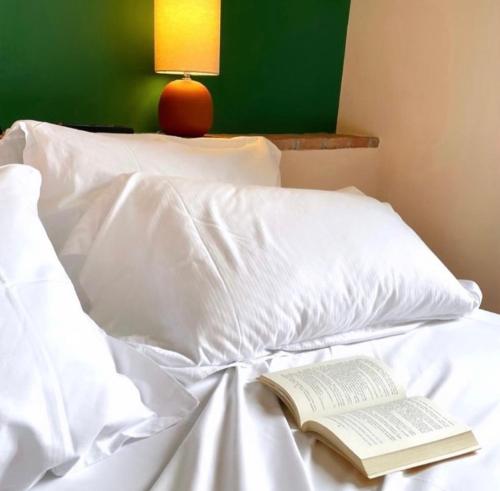 Ένα ή περισσότερα κρεβάτια σε δωμάτιο στο Hotel-Motel70