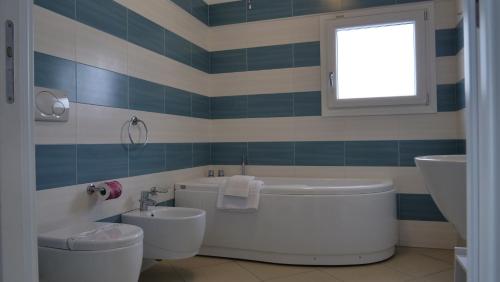 Vannituba majutusasutuses La Corte di Leuca Residence