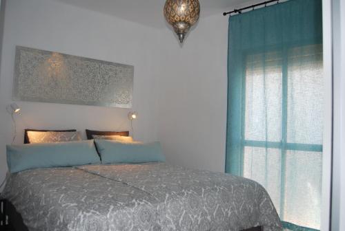 Postel nebo postele na pokoji v ubytování AP290 - Casa Olivia