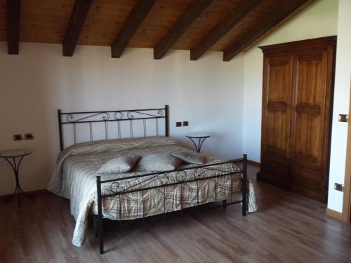 Voodi või voodid majutusasutuse Farmstay Alloggio Cort di Branc toas