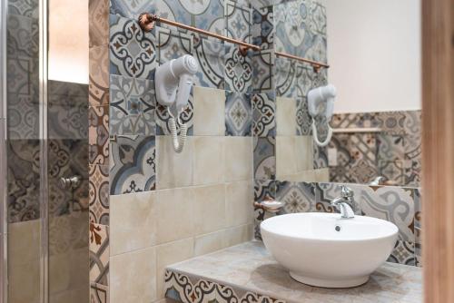 Ett badrum på Sisula Country Hotel & SPA