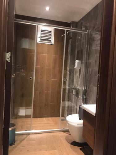 Ένα μπάνιο στο Kibar Suite Hotel