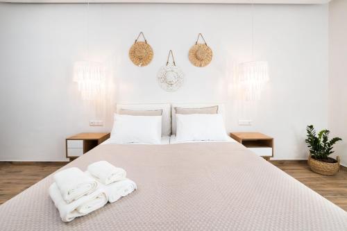 Posteľ alebo postele v izbe v ubytovaní Naxian Memories Apartments