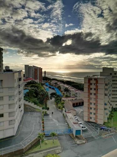 a view of a city with the ocean and buildings at 65 @ Zeezicht in Kingsburgh
