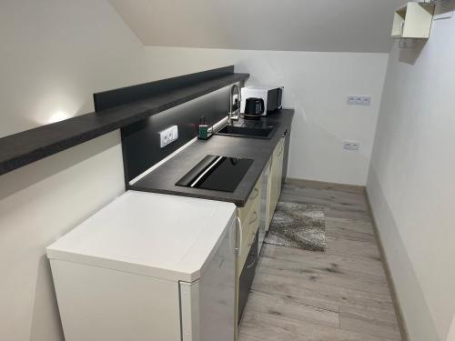 Η κουζίνα ή μικρή κουζίνα στο Apartmán TiSa
