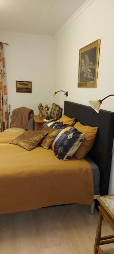 Postel nebo postele na pokoji v ubytování Pilane B&B