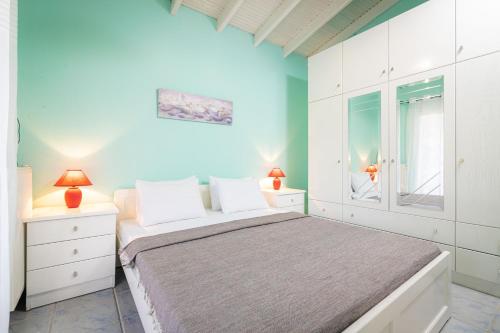 Postel nebo postele na pokoji v ubytování F & B Summer Collection - Paliouri