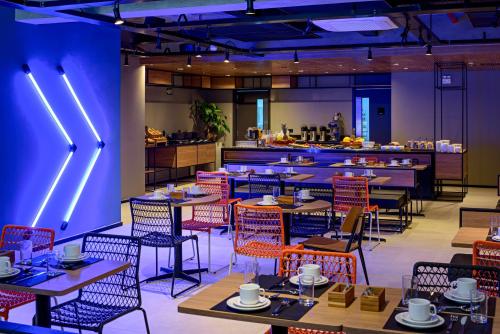 Restoran atau tempat lain untuk makan di Ibis Budget Balneario Camboriu