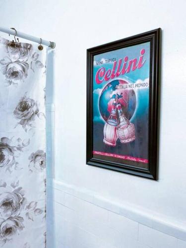 a movie poster on a wall in a bathroom at (53.1N) Walk to Forest Park in Comfort! in Saint Louis