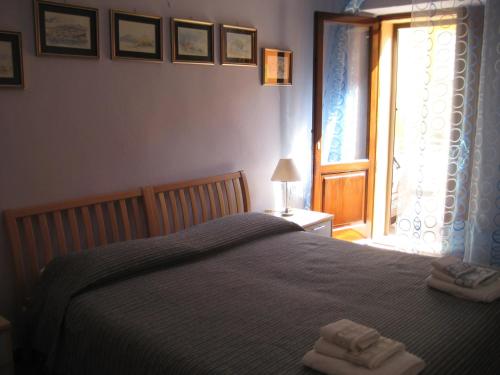 Postel nebo postele na pokoji v ubytování Sa Domo de Minnanna
