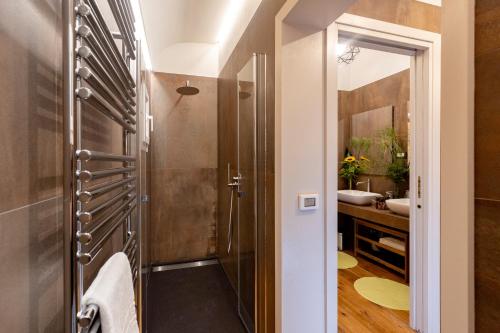 a bathroom with a shower and a sink at Palazzo Guajana in Trapani