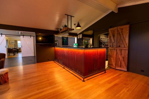 an empty room with a bar in the middle of a room at Aurora Lodge Hotel in Hvolsvöllur