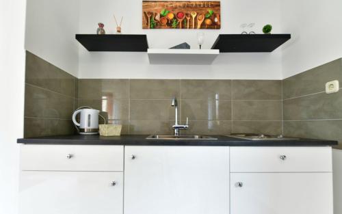 Køkken eller tekøkken på Apartman Mate