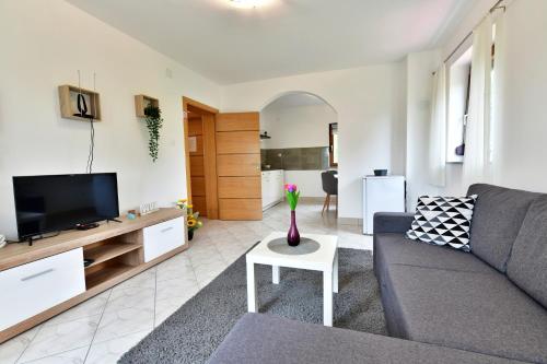 Et tv og/eller underholdning på Apartman Mate