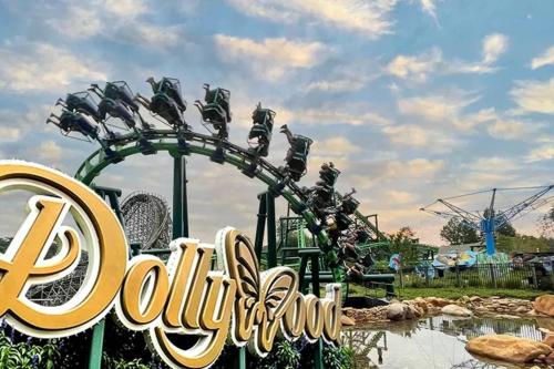 a roller coaster at a theme park at Rustic Modern Getaway - Mtn View - Creek - Hammock - Rest in Sevierville