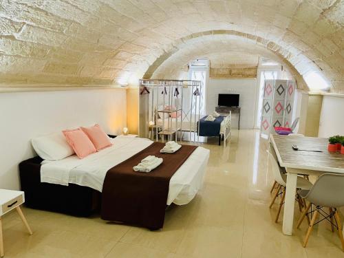 A bed or beds in a room at B&B Pietramare