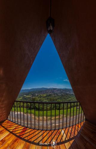 a view from the balcony of a house at Villa de los Vientos in Cuetzalán del Progreso