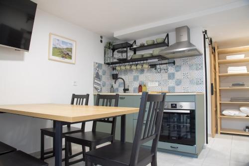 Kuchyň nebo kuchyňský kout v ubytování Apartma Licko