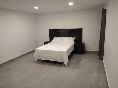 מיטה או מיטות בחדר ב-Casa M&J Cd. Juarez