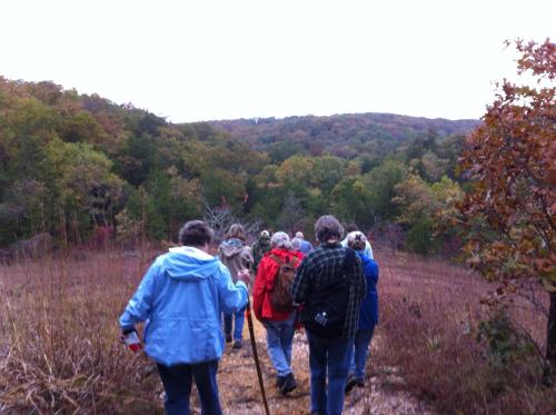 a group of people walking down a trail at Beautiful Parkside Suite in Saint James