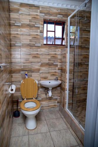 Ένα μπάνιο στο Ecogreen Guesthouse