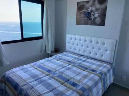 Ένα ή περισσότερα κρεβάτια σε δωμάτιο στο APARTAMENTO PORTO REAL RESORT VISTA ESPETACULAR 2