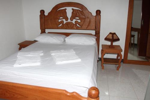Vuode tai vuoteita majoituspaikassa Hotel Fazenda Arara Azul