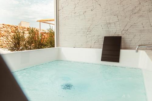 Bazén v ubytovaní Da Riva Suite & Pool - Housea alebo v jeho blízkosti