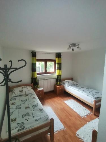 Gulta vai gultas numurā naktsmītnē Apartment Old Town