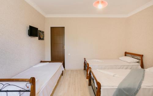Postel nebo postele na pokoji v ubytování Marcos Hotel