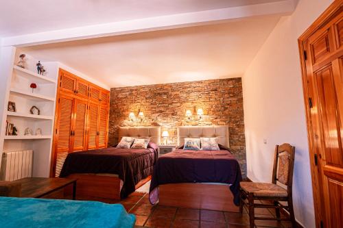 Cama o camas de una habitación en Casa rural Villa Cristina
