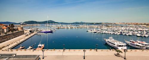 a harbor filled with lots of boats in the water at Vista Porto in Alghero