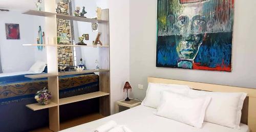 Llit o llits en una habitació de Aira Apartment
