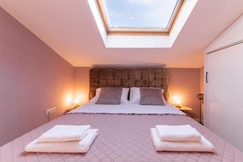 Voodi või voodid majutusasutuse Deluxe Suite Bambi with Panoramic View toas