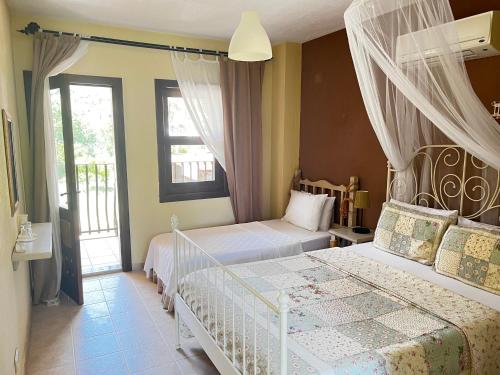 A bed or beds in a room at Han Boutique Hotel