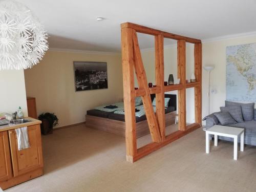 a living room with a bunk bed and a couch at Apartement in Seelze Lohnde in Seelze