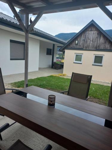 a table with a cell phone sitting on top of it at Ferienhaus Am-moore in Steindorf am Ossiacher See