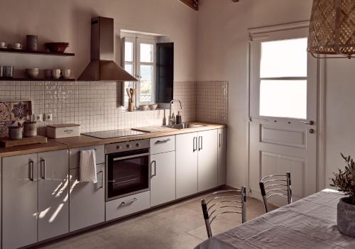 Φωτογραφία από το άλμπουμ του Dounias Village Home - Traditional Architecture & Modern Luxury στο Κορίθι