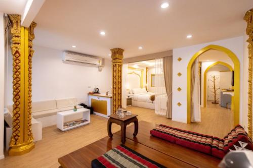 Posezení v ubytování One Dhatu Ayutthaya Premium Homestay